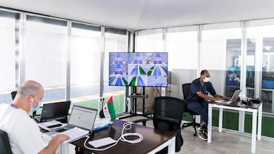 Staff work at Seha’s Covid-19 drive-through testing centre in Ras Al Khaimah.