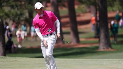 Rory McIlroy putts on the seventh hole. EPA