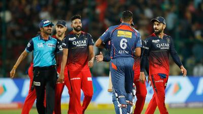 Lucknow Super Giants defeated Virat Kohli's, right, Royal Challengers Bangalore at the Chinnaswamy Stadium in Bengaluru on Monday, April 10, 2023. Spotzpics for IPL