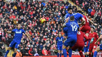 Liverpool's Diogo Jota, partially hidden, heads home the opening goal. AFP
