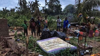 Residents survey the damage in Nacate village, south of Macomia, Mozambique, following the destruction by Cyclone Kenneth. Heavy rains from a powerful cyclone lashed northern Mozambique sparking fears of flooding as aid workers arrived to assess the damage, just weeks after the country suffered one of the worst storms in its history. AFP