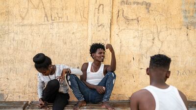 Flmon, left, and Grmaoui wait in a transit centre for new refugee arrivals from Eritrea in Wadsharefy, the oldest camp in eastern Sudan. Flmon says he fled to the country to escape military service. ‘We cannot even breathe," he says. Getty