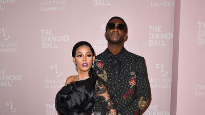 Jamaican model Keyshia Ka'Oir and American rapper Gucci Mane put a playful spin on their all-black ensembles, AFP