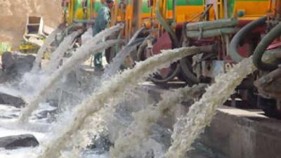 Sewage trucks being emptied at the musk lake.