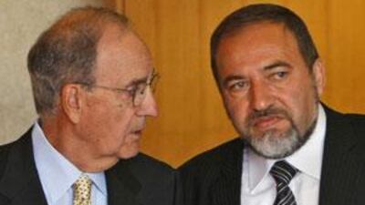 George Mitchell, left, talks to Avigdor Lieberman after their meeting in Jerusalem.