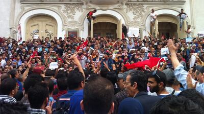 Tunisians are demanding to know where the oil is through a social media campaign and a series of demonstrations such as this protest in Tunis last month. They want to see more transparency in the government’s management of its natural resources. Eileen Byrne for The National