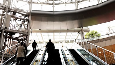 A huge banner celebrating Reiwa, Japan's new imperial era, is displayed on the first day of the Emperor Naruhito’s accession to the throne at a business district in Tokyo. Reuters