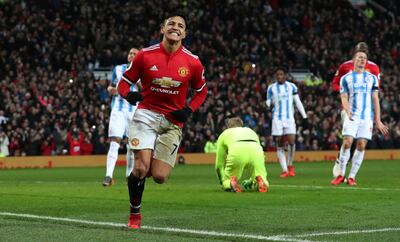Manchester United’s Alexis Sanchez celebrates scoring against Huddersfield Town. It was the Chilean's first Premier League goal for his new club. Scott Heppell / Reuters