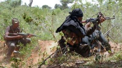 Fighters of the Liberation Tigers for Tamil Eelam exchange fire with Sri Lankan government soldiers in the rebel-held district of Wanni.