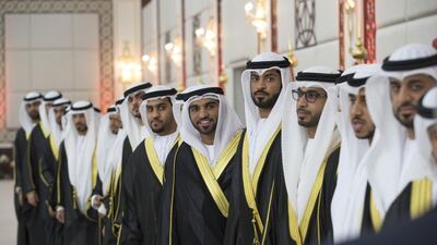The grooms line up during the wedding. Donald Weber / Crown Prince Court - Abu Dhabi