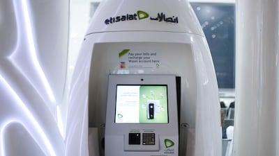 A self-service bill payment machine outside an Etisalat store in Dubai Mall. The company is among several regional global powerhouses, according to BCG. Sarah Dea/The National