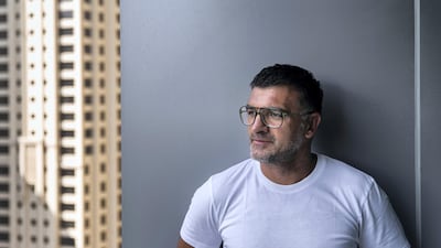 John Sanei, who grew up in Swaziland, says his upbringing was a difficult time because the family struggled financially. Reem Mohammed