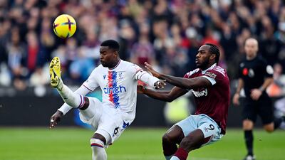 Crystal Palace's Marc Guehi is put under pressure by West Ham's Michail Antonio. Reuters