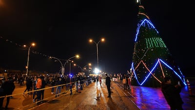 Iraqi people attend the celebrations for new year's eve in Mosul on December 31, 2018. AFP