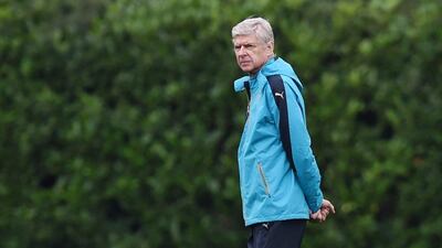 Arsenal manager Arsene Wenger observes his side during a training session on Monday ahead of their Champions League match against Bayern Munich on Tuesday. Tony O'Brien / Action Images / Reuters / October 19, 2015