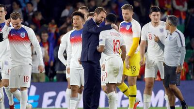 England manager Gareth Southgate with Raheem Sterling after the Manchester City winger scored twice in the 3-2 win over Spain. EPA