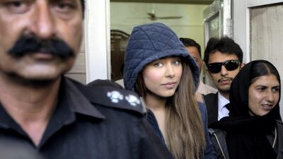 Pakistani model Ayyan Ali, pictured leaving court in 2015, has been accused of smuggling $500,000 in undeclared cash from Islamabad to Dubai. AP