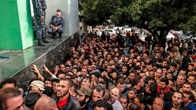Palestinians gather to receive money aid from Qatar government to poor families in Gaza city on November 10, 2018. AFP