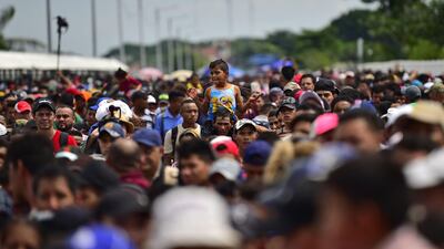 Crowds gather at the gate. AFP
