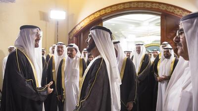 Sheikh Mohammed bin Zayed Crown Prince of Abu Dhabi Deputy Supreme Commander of the Armed Forces (L) and Sheikh Mohammed bin Rashid, Vice President and Ruler of Dubai (C) attend the 44th UAE National Day celebrations at Zayed Sports City. Seen with Sheikh Hamdan bin Rashid, Deputy Ruler of Dubai and Minister of Finance and Industry (R) and other dignitaries. Mohamed Al Hammadi / Crown Prince Court - Abu Dhabi