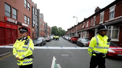 Police stand in front of a cordon in Rusholme, Manchester, Britain June 2, 2017. REUTERS/Andrew Yates