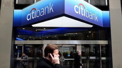 Citibank hopes to save $900 million next year through job cuts and an additional amount of more than $1.1bn annually from 2014. Andrew Gombert / EPA