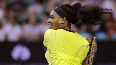 Serena Williams hits a backhand return against Daria Kasatkina on Friday during her Australian Open third round victory. Aaron Favila / AP / January 22, 2016