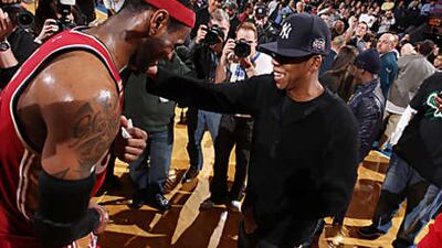 LeBron James, left, seen here with Jay-Z, gave the Nets and the hip-hop artist 90 minutes of his time as the free agent considers switching to a new NBA team.