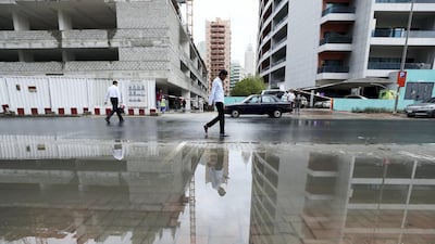 A large area of standing water in Barsha Heights, Dubai. Chris Whiteoak / The National