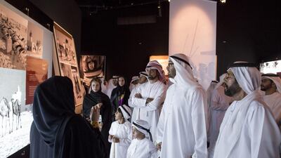 Right to left: Sheikh Tahnoon bin Mohammed Al Nahyan Ruler’s Representative of the Eastern Region, Sheikh Mohammed bin Zayed, Sheikh Ammar bin Humaid, and Sheikh Tahnoon bin Mohammed bin Tahnoon (bottom C), tour the Qasr Al Hosn exhibition. Ryan Carter / Crown Prince Court - Abu Dhabi