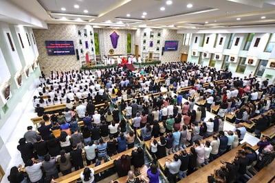 Christians flocked to St Therese Church in Abu Dhabi. Victor Besa / The National