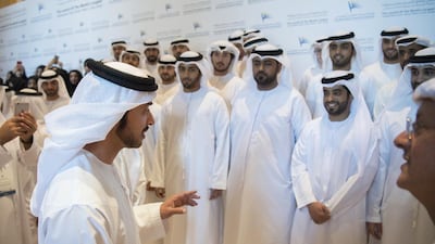 Sheikh Hazza bin Zayed, Vice Chairman of the Abu Dhabi Executive Council, speaks with Abu Dhabi Water & Electricity Authority staff members during the inauguration ceremony of the new Sweihan Solar Photovoltaic Plant, at Emirates Palace. Hamad Al Kaabi / Crown Prince Court - Abu Dhabi