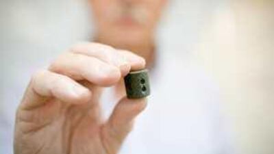 Kim Burke, logistics manager of GRM International, found the bronze age scroll on the ground surface near Madinat Zayed.