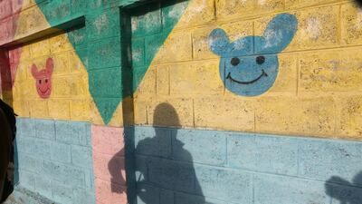 A shadow of an Indian paramilitary soldier as he stands guard during a gun battle on the outskirts of Srinagar, the summer capital of Indian Kashmir. Farooq Khan / EPA