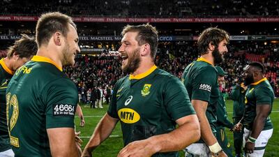 Frans Steyn, with Andre Esterhuizen, celebrates South Africa's Rugby Championship win over Australia. Getty