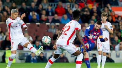 Lionel Messi scores his first and Barca's second. AP