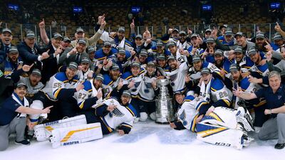 The St. Louis Blues celebrate with the Stanley Cup after they defeated the Boston Bruins in Game 7 of the NHL Stanley Cup Final in Boston. AP Photo