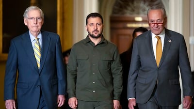 From left, Senator Mitch McConnell, Ukrainian President Volodymyr Zelenskyy and Senate majority leader Chuck Schumer at Capitol Hill in Washington, in September. AP