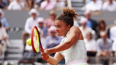 Jasmine Paolini plays a backhand against Iga Swiatek. Getty Images