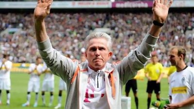 Bayern Munich’s coach Jupp Heynckes waves to acknowledge well-deserved cheers. In his return to Bayern for a third stint he has led them to the domestic league title and Uefa Champions League final.