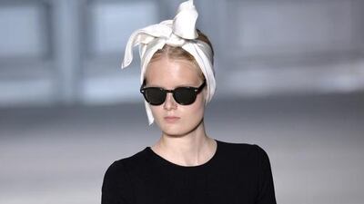 There were more modern elements at Giambattista Valli, whose Valli girls will snap up his white party dresses with their delicate green embroideries and flowered column skirts with black sweaters. Miguel Medina / AFP