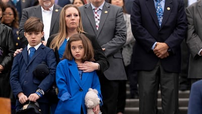 The family of late US Capitol Police Officer William Evans listen during the remembrance ceremony. Getty / AFP
