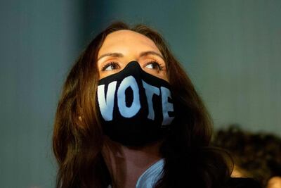 People pay their respects to Ruth Bader Ginsburg outside the New York State Civil Supreme Court building in New York. Kena Betancur / AFP