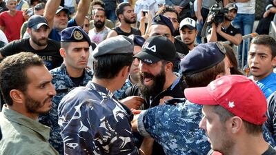 Demonstrators clash with policemen. EPA