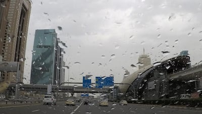 Rain on Sheikh Zayed Road in Dubai. Pawan Singh / The National