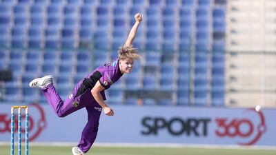 Nathan Ellis of Hobart Hurricanes bowling.