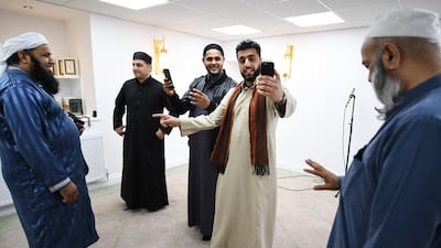Members of the Muslim community attend the opening of the first mosque built on the Western Isles, Stornoway, Scotland, on May 11, 2018. Jeff J Mitchell / Getty Images