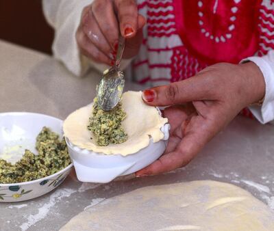 The sambousa is filled with meat, herbs and cheese. Victor Besa / The National