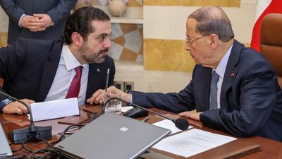 Lebanese president Michel Aoun (R) and prime minister Saad Hariri attend the first cabinet meeting since Mr Hariri's return, at the presidential palace of Baabda, east of Beirut, on December 5, 2017. Dalati Nohra / EPA