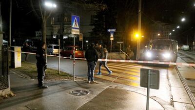 Police stand in front of the Iranian ambassador's residence after an attack in Vienna, Austria, on March 12, 2018. Ronald Zak / AP